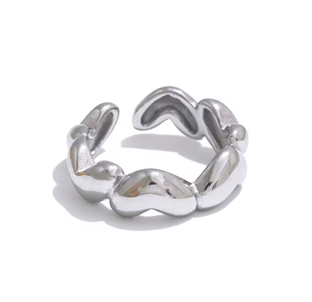 Anillo de corazones plateado