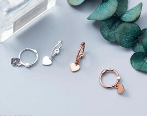 Mini arracada con corazón colgante rosado