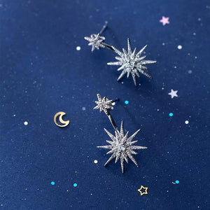 Doble estrella con zirconias plateada