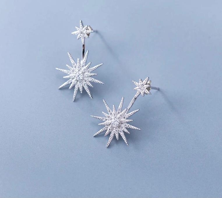 Doble estrella con zirconias plateada