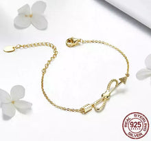 Cargar imagen en el visor de la galería, Pulsera oro, infinito, corazón y flecha
