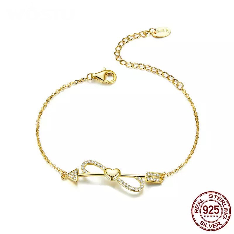 Pulsera oro, infinito, corazón y flecha