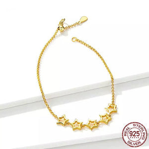 Pulsera estrellas doradas