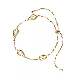 Pulsera dorada con conchitas de mar