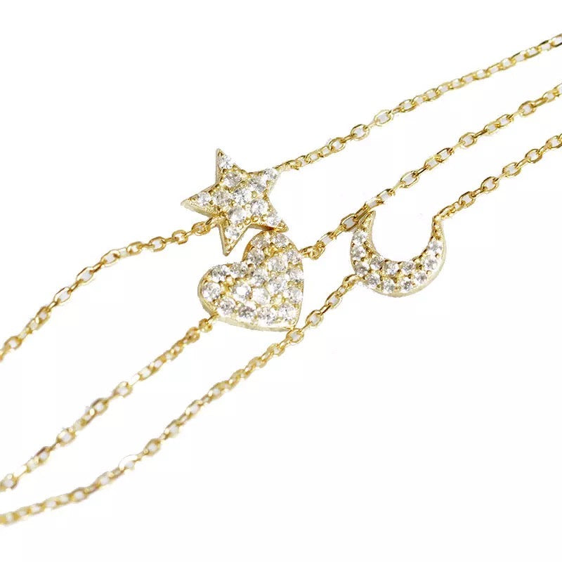 Pulsera dorada triple corazón, luna y estrella