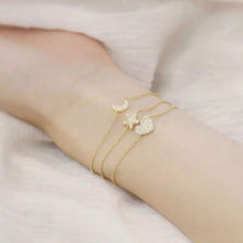 Cargar imagen en el visor de la galería, Pulsera dorada triple corazón, luna y estrella

