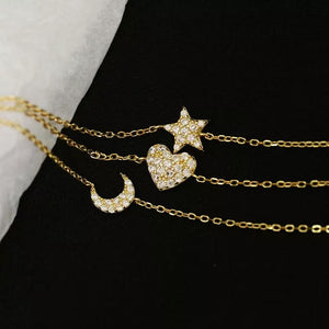 Pulsera dorada triple corazón, luna y estrella